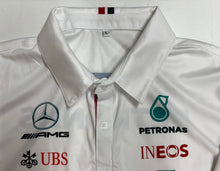 Load image into Gallery viewer, Lewis Hamilton F1 memorabilia with signed shirt and print