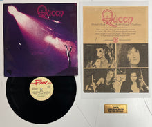 Load image into Gallery viewer, Queen signed Rolling Stone magazine page
