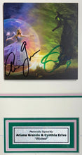 Load image into Gallery viewer, WICKED - ARIANA GRANDE &amp; CYNTHIA ERIVO Signed Soundtrack CD &amp; Poster Display

