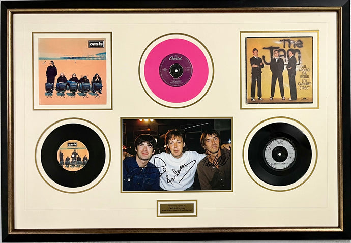 Paul McCartney signed photo and record display