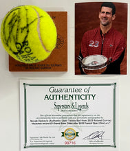 Load image into Gallery viewer, NOVAK DJOKOVIC Signed &amp; Authentic Used Tennis Ball from 2023 Roland Garros on Official Base
