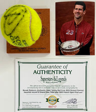 Load image into Gallery viewer, NOVAK DJOKOVIC Signed &amp; Authentic Used Tennis Ball from 2023 Roland Garros on Official Base
