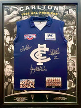 Load image into Gallery viewer, STEPHEN KERNAHAN, GREG WILLIAMS &amp; DAVID PARKIN Signed 1995 AFL Premiers Jumper Display2
