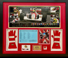 Load image into Gallery viewer, 2x FRAMES - MICHAEL SCHUMACHER Signed Scuderia Ferrari Photo &amp; Race Suit Frame &amp; AYRTON SENNA Signed 1990 Silverstone F1 GP Programme Page &amp; “Piece of McLaren Car” &amp; Gloves Frame
