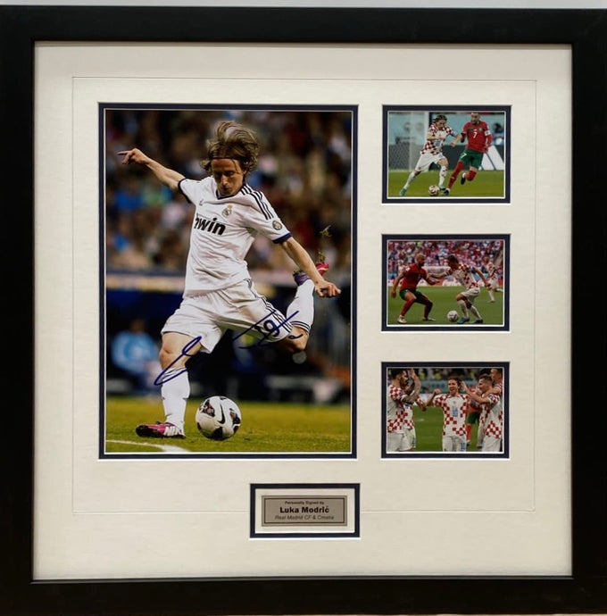 Close-up of Luka Modric signature on FIFA World Cup photo