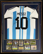 Load image into Gallery viewer, LIONEL MESSI “2022 World Cup Champions” Signed Argentina Jersey &amp; Photo Collage Display
