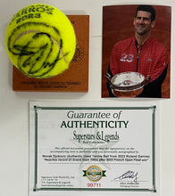 Load image into Gallery viewer, NOVAK DJOKOVIC Signed &amp; Authentic Used Tennis Ball from 2023 Roland Garros on Official Base
