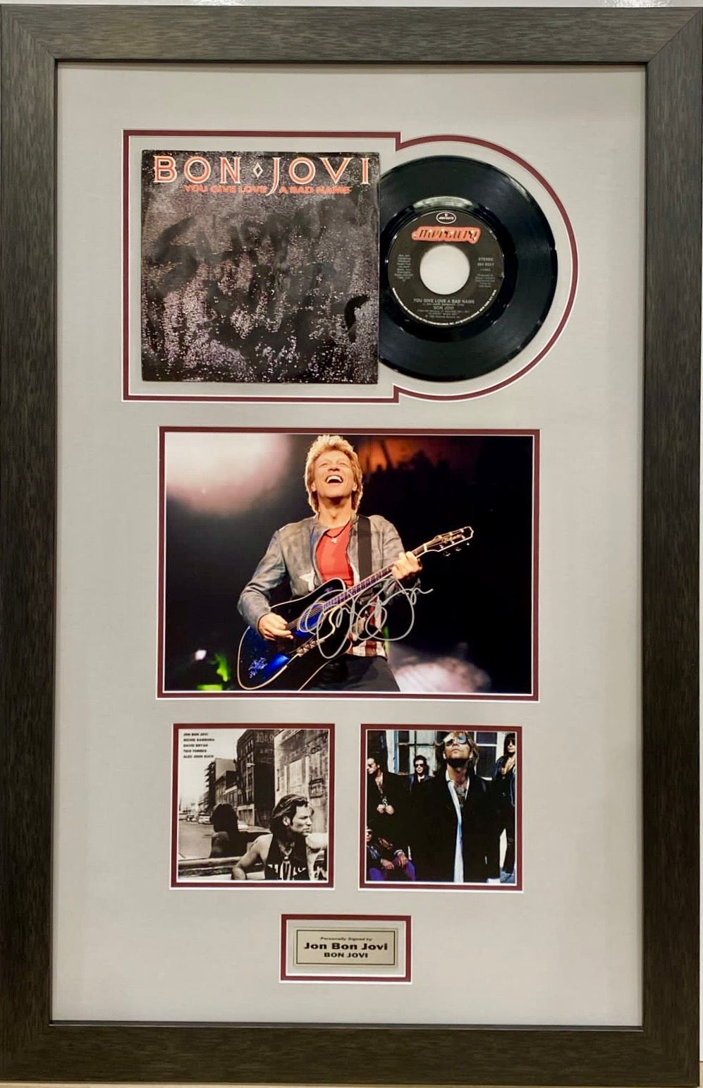 Bon Jovi signed photo and Slippery When Wet record display