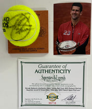 Load image into Gallery viewer, NOVAK DJOKOVIC Signed &amp; Authentic Used Tennis Ball from 2023 Roland Garros on Official Base
