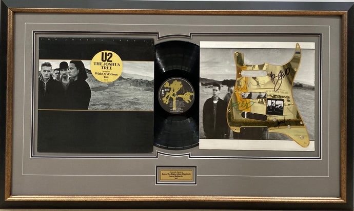 U2 signed guitar pickguard display