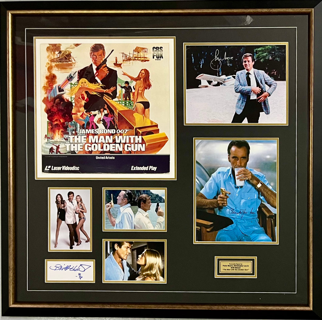 JAMES BOND “THE MAN WITH THE GOLDEN GUN” - Roger Moore, Christopher Lee & Britt Ekland Signed Photos Display