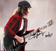 Load image into Gallery viewer, ACDC - ANGUS YOUNG Signed Photo &amp;  Poster Display
