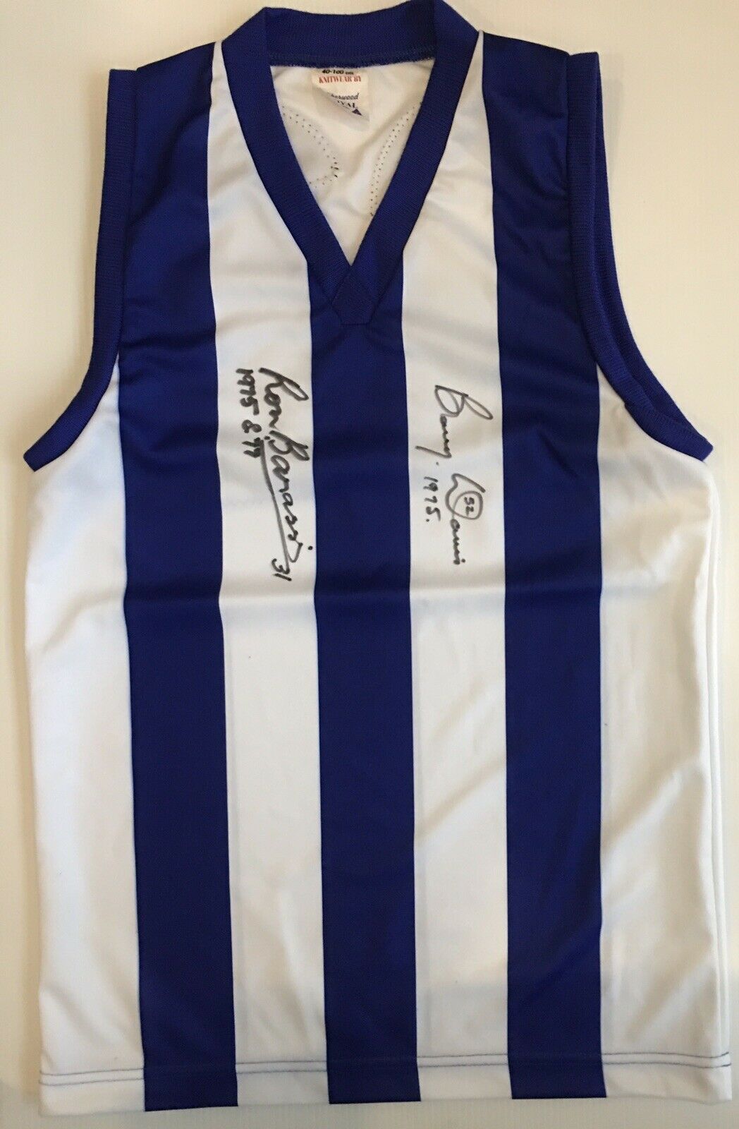 Unframed BARRY DAVIS & RON BARASSI “1975 Premiers” Signed North Melbourne Jumper