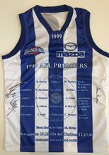 Load image into Gallery viewer, Unframed WAYNE CAREY &amp; DENIS PAGAN Signed &quot;1999 Premiers&quot; North Melbourne Jumper
