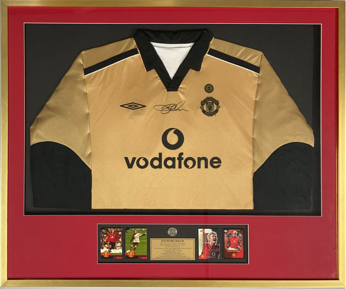 Signed gold jersey of David Beckham