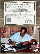 Load image into Gallery viewer, RUBIN “HURRICANE” CARTER Signed Boxing Glove &amp; Photo Display
