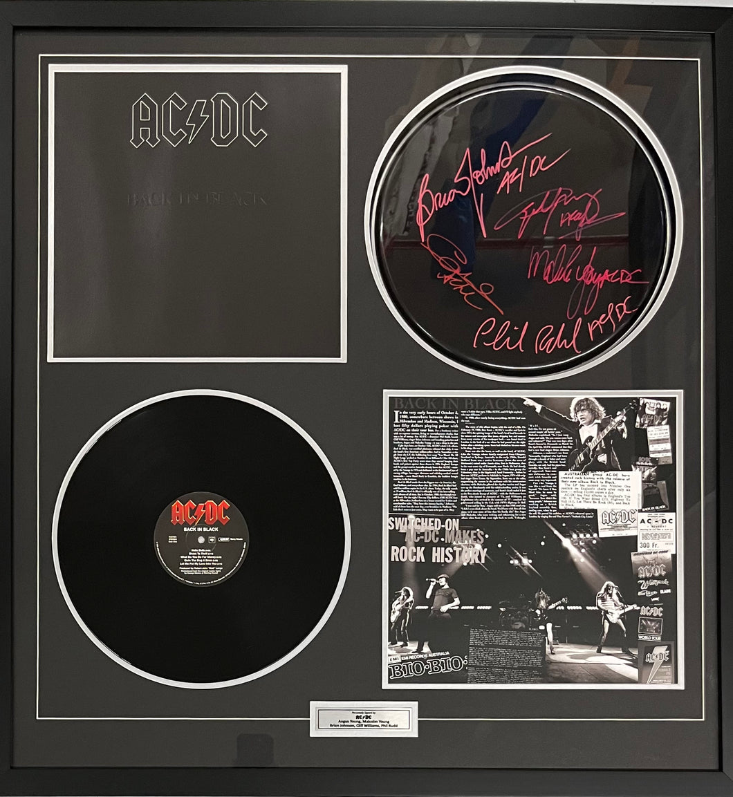 ACDC - ANGUS YOUNG, BRIAN JOHNSON, MALCOLM YOUNG, CLIFF WILLIAMS & PHIL RUDD Signed Drumhead & LP Display